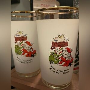 Set Of four North Pole Santa Cups With Gold Trim